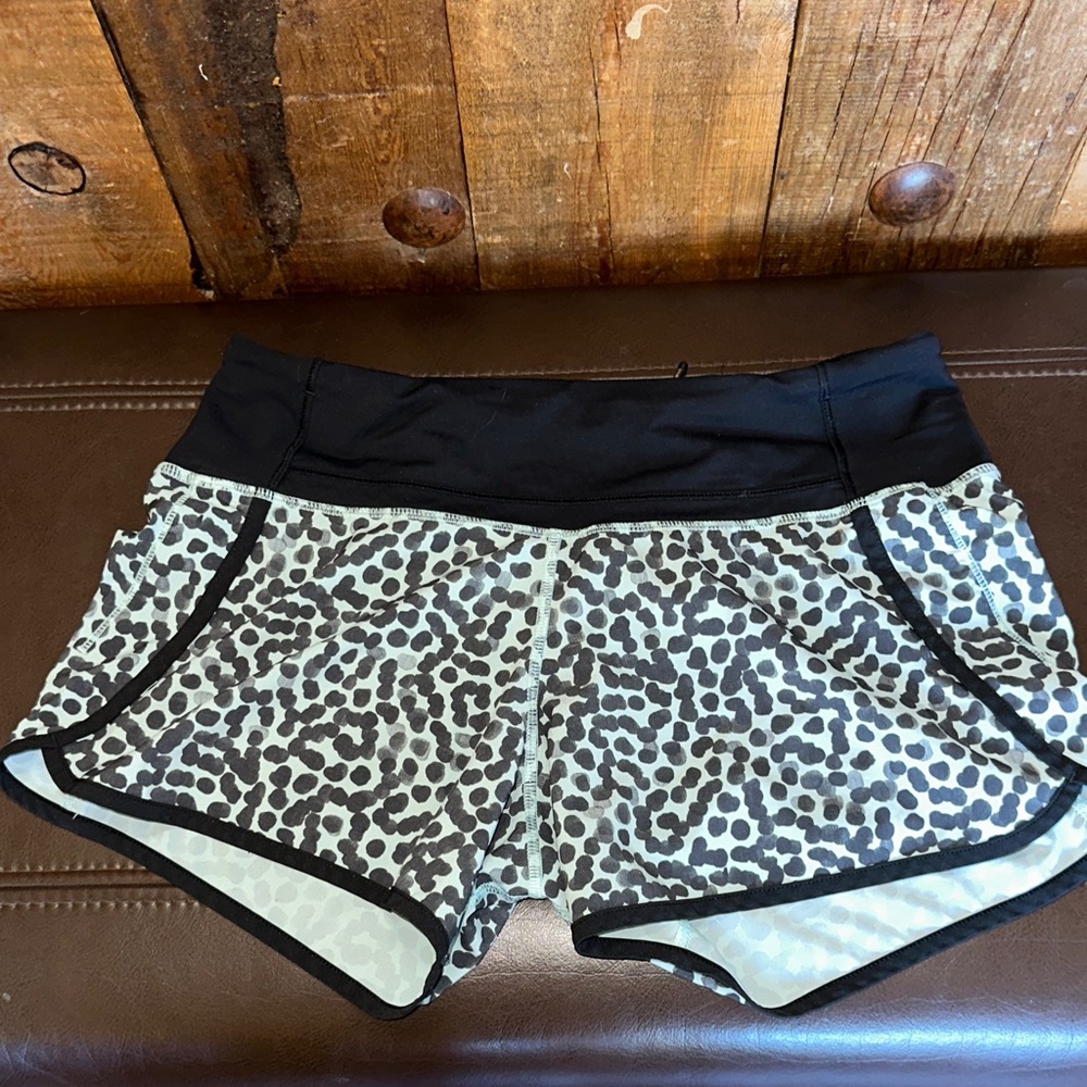 Lululemon Athletica Seafoam green and black athletic shorts.